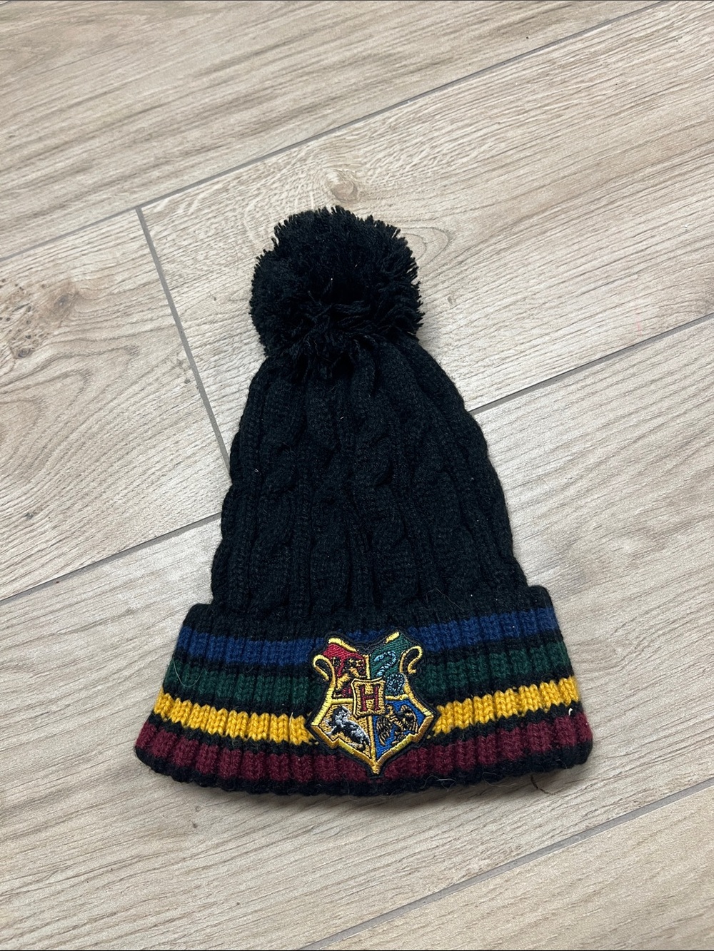 Kids Black Knit Pom Beanie with Multicolor Stripe and Crest Harry Potter